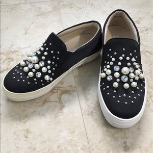 Steve Madden slip on sneakers.
